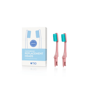 TIO Náhradné hlavice k zubnej kefke (ultra soft) (2 ks) - korálovo ružová